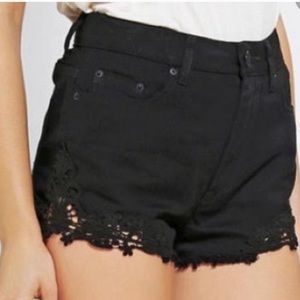UO BDG high rise cheeky black denim lace shorts
